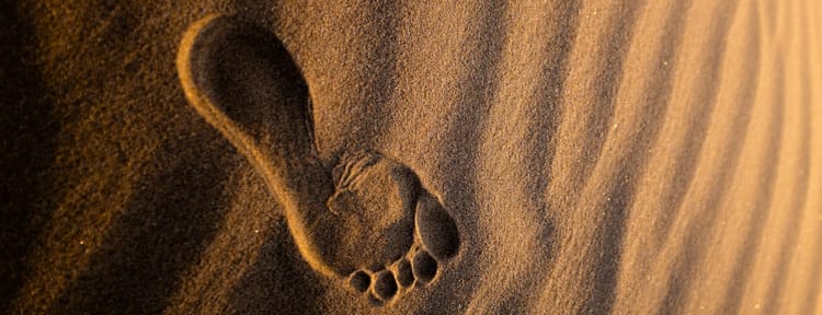 single footprint in sand