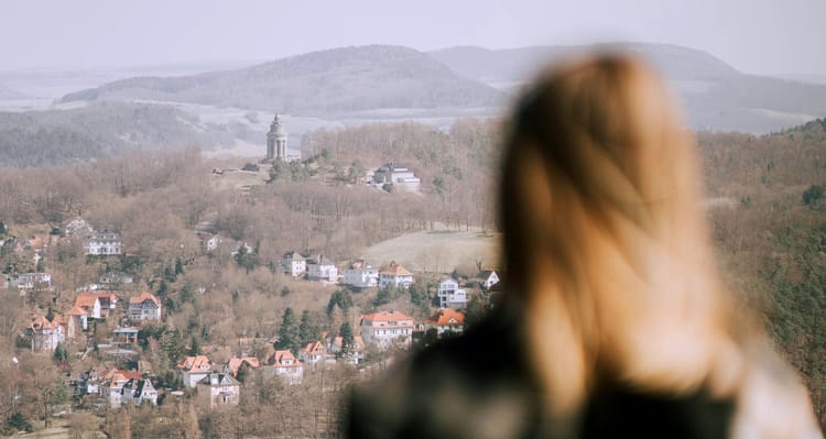 blurry photo of a person facing away from the camera