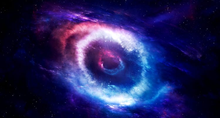 a galaxy in space roughly in the shape of a human eye