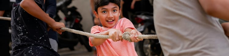 kids tugging on a rope